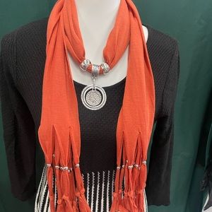 NEW orange scarf with decorative silver pendant